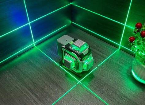 What is a laser level, and what is the principle behind it?